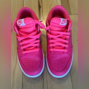 Nike Dunk Low sneakers in the "Hyper Pink" colorway. Women’s size 6!